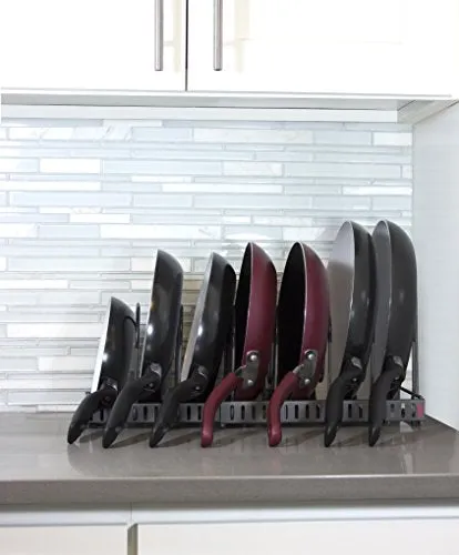 THIS EXPANDING ORGANIZER RACK THAT CAN FIT UP TO SEVEN PANS